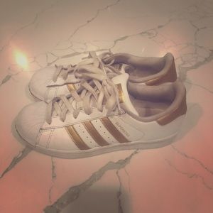 Gold Adidas superstars
